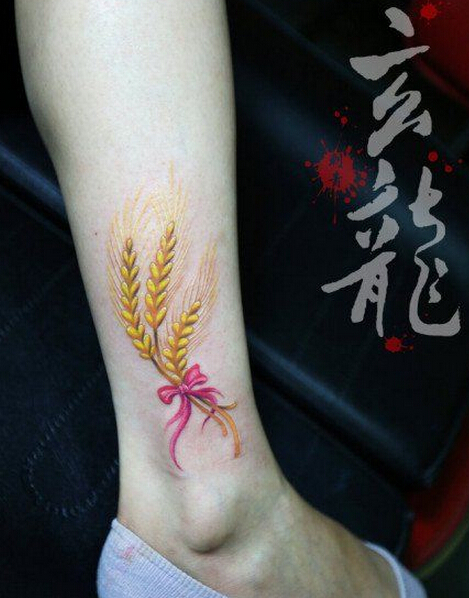 点击大图看下一张：女生腿部唯美的麦穗彩绘纹身图案