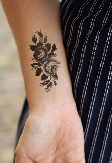点击大图看下一张：女生彩绘纹身技巧小清新植物纹身文艺花朵纹身图案