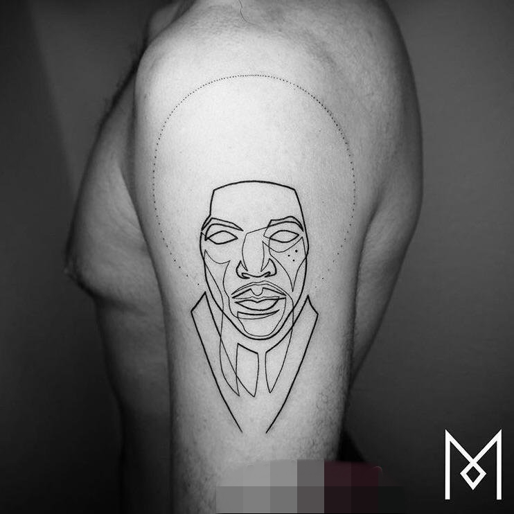 点击大图看下一张：手臂上黑白几何元素简单个性线条人物肖像纹身图片
