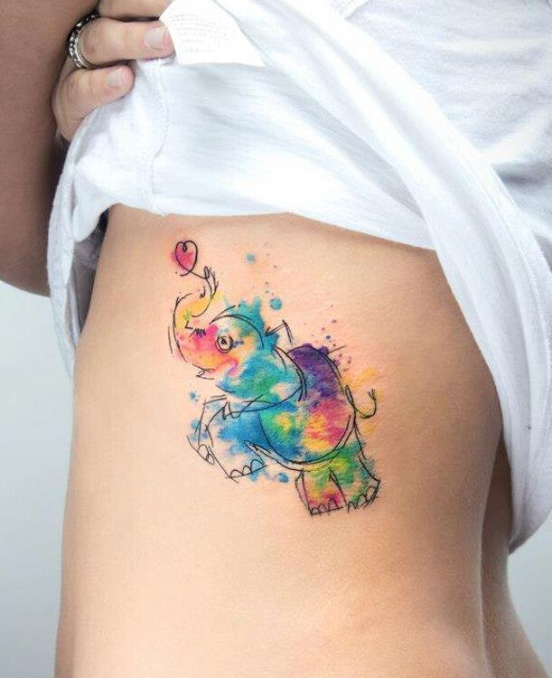 点击大图看下一张：女生腰部大象彩色泼墨纹身图案