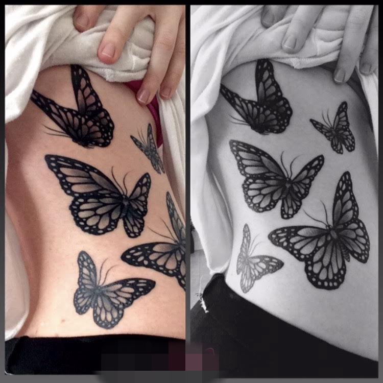 点击大图看下一张：女生侧腰上黑白点刺技巧小动物几何元素蝴蝶纹身图片