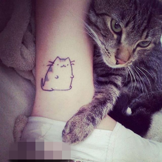 点击大图看下一张：女生个性黑白简约线条小动物猫咪纹身图案