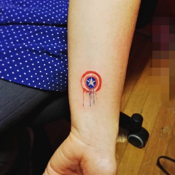 点击大图看下一张：女生水彩小清新植物花纹身图案