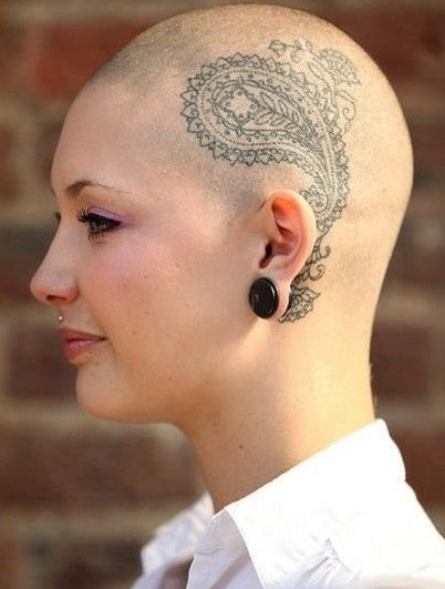 点击大图看下一张：美女头部个性梵花纹身图案