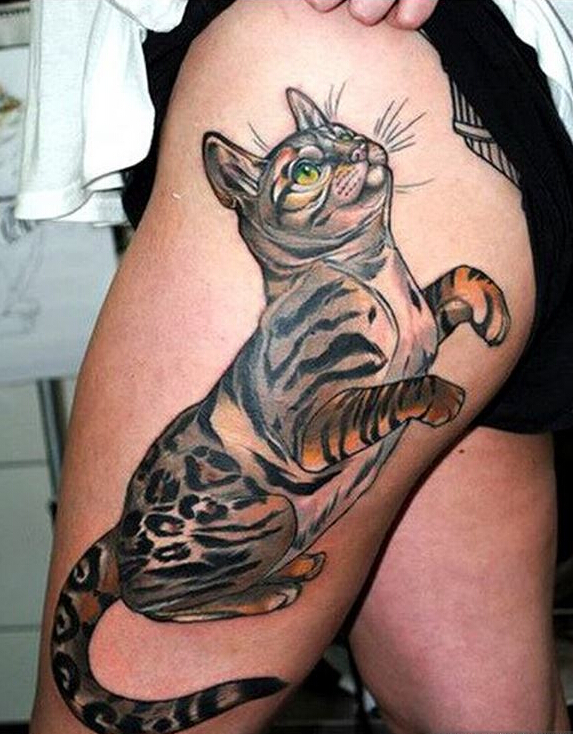 点击大图看下一张：女性腿部时尚好看的猫咪纹身图案