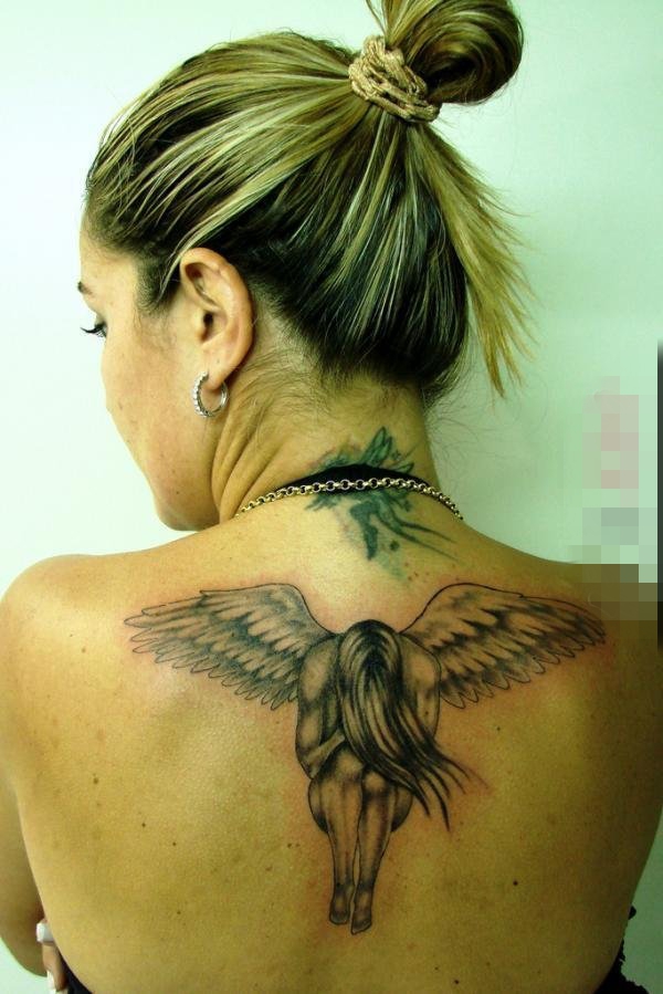 点击大图看下一张：多款黑色素描创意天使翅膀纹身图案