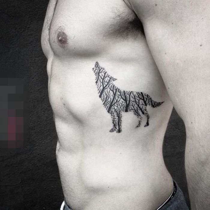 点击大图看下一张：男生喜爱的凶残霸气的点刺技巧几何线条狼头纹身图案