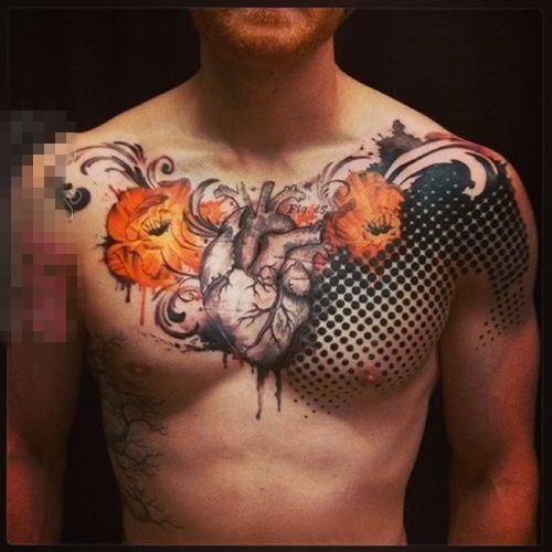 点击大图看下一张：适合男生的胸口彩绘创意多技巧纹身图案