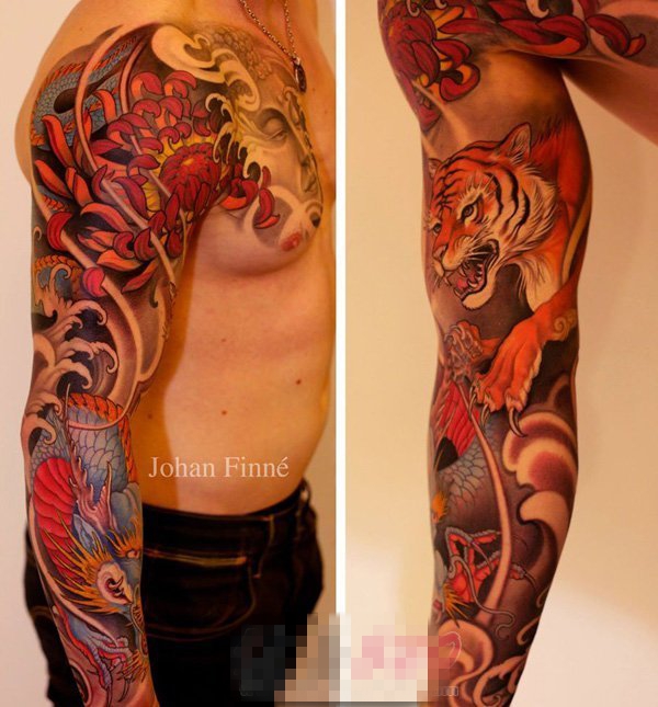 点击大图看下一张：男生手臂上彩绘抽象线条霸气老虎纹身图片