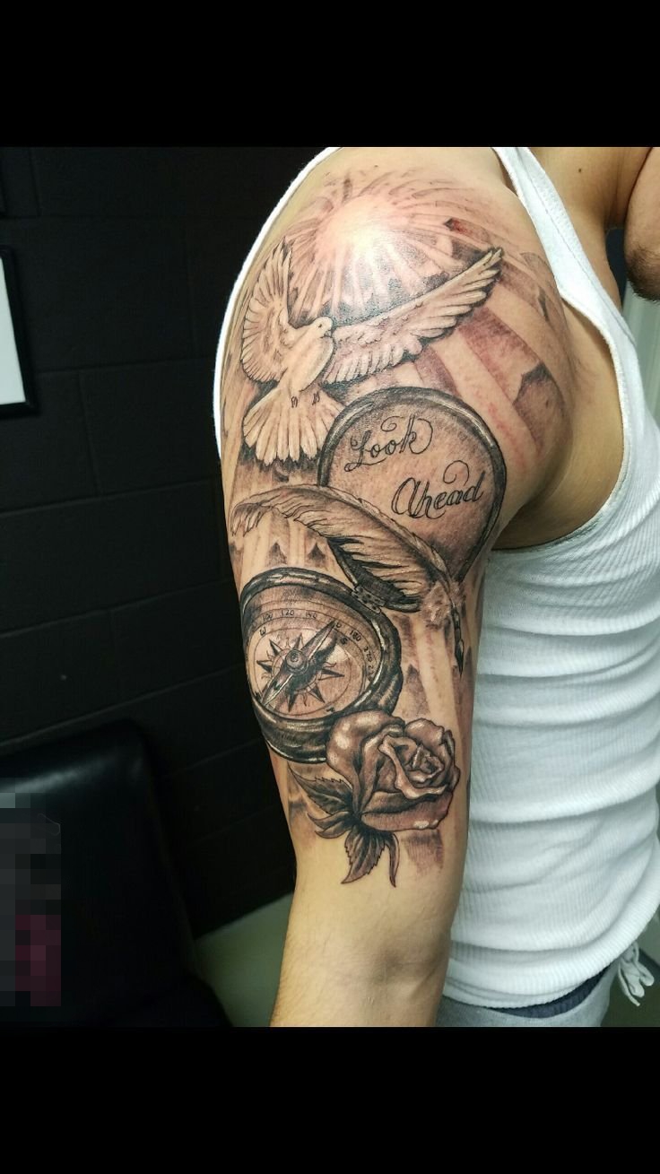 点击大图看下一张：男生说手臂上黑色饿素描创意鸟和钟表玫瑰纹身图片