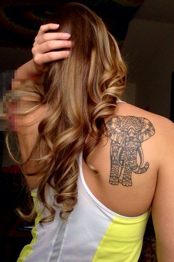 点击大图看下一张：女生肩部黑色几何线条小动物大象纹身图片