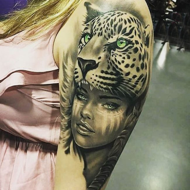 点击大图看下一张：女生手臂上黑灰点刺豹和人物肖像纹身图片