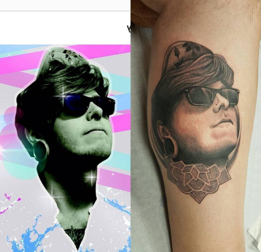 点击大图看下一张：男生手臂上黑灰素描创意男生人物肖像纹身图片