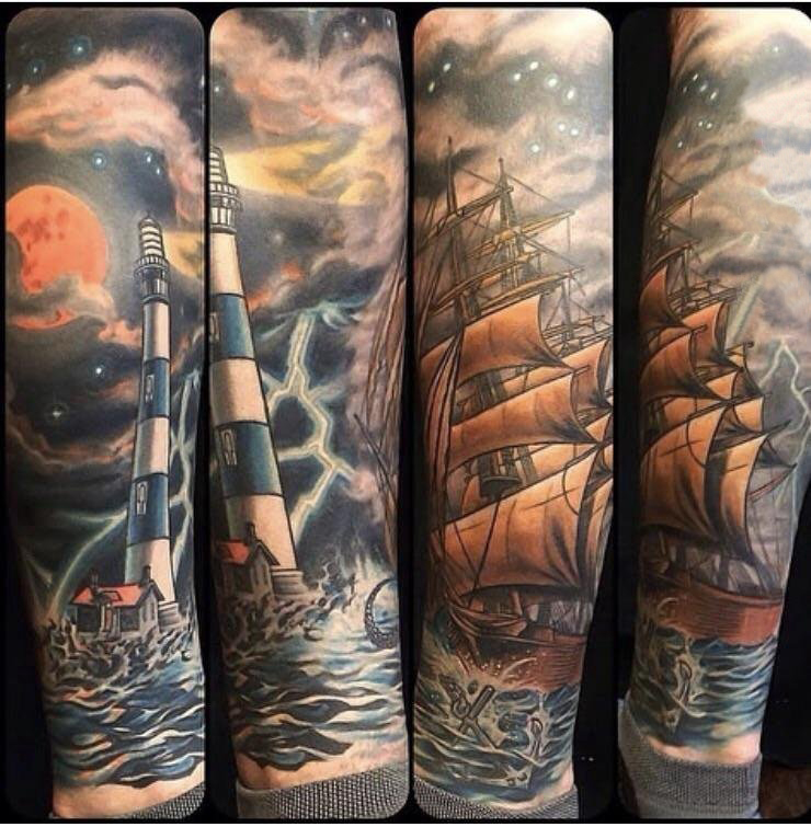 点击大图看下一张：男生手臂上彩绘抽象线条灯塔和帆船纹身图片