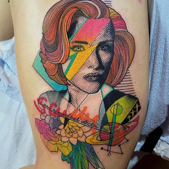 点击大图看下一张：女生大腿上彩绘水彩创意精致女生人物纹身图片