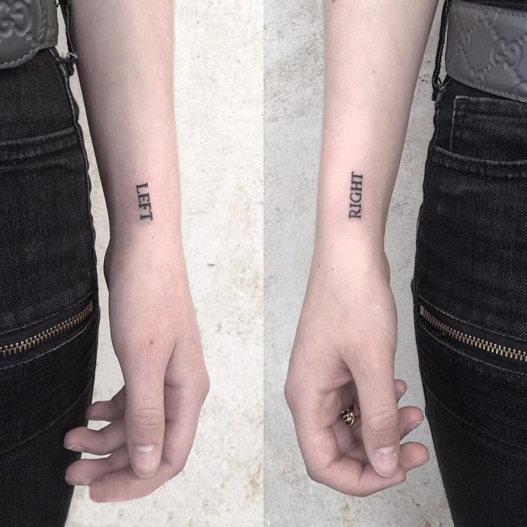 点击大图看下一张：闺蜜手腕上黑色简单线条有意义的英文单词纹身图片