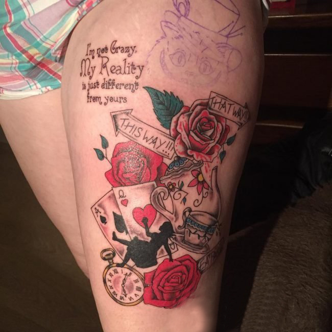 点击大图看下一张：女生大腿上彩绘水彩素描创意文艺唯美花朵纹身图片