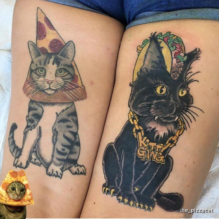 点击大图看下一张：女生大腿上彩绘简单线条创意小动物猫咪纹身图片