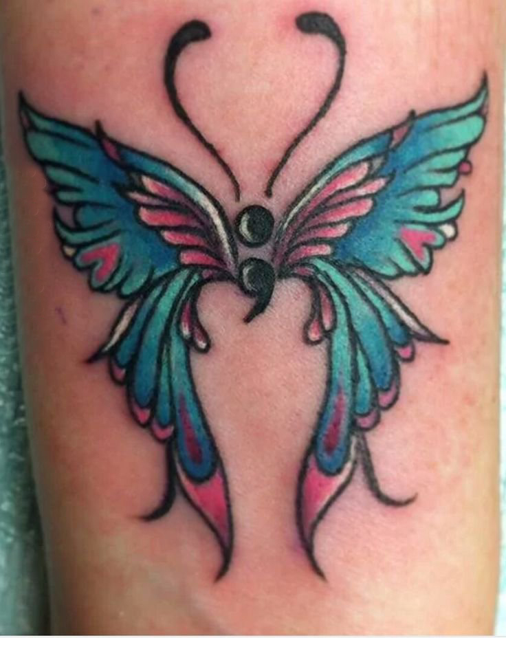 点击大图看下一张：女生手臂上彩绘水彩素描创意文艺蝴蝶冒号纹身图片