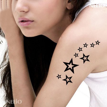 点击大图看下一张：女生手臂上黑色线条创意文艺星星纹身图片
