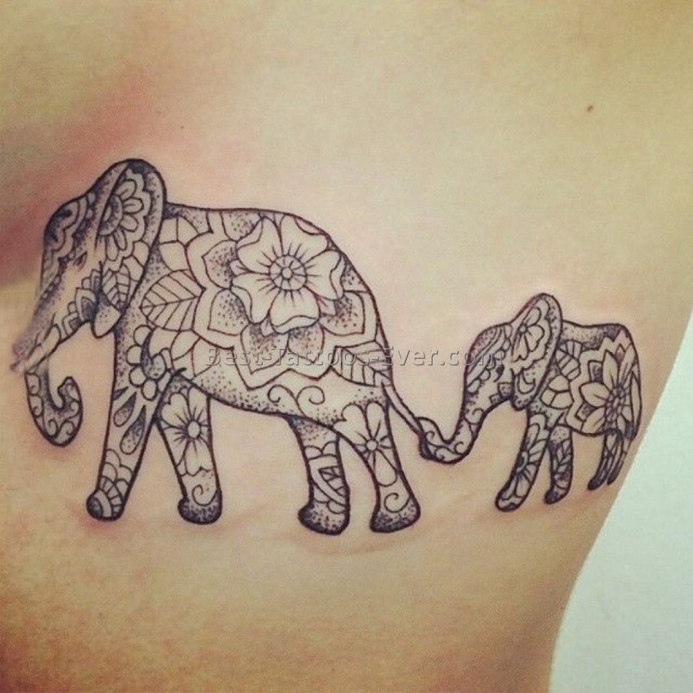 点击大图看下一张：女生侧腰上黑灰素描点刺技巧创意花纹大象纹身图片