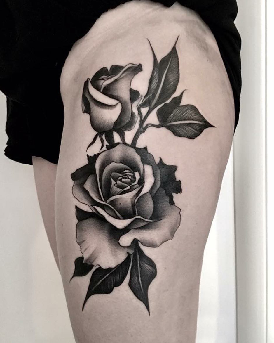 点击大图看下一张：女生大腿上黑灰素描点刺技巧创意唯美精致玫瑰纹身图片