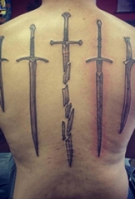 男生后背上黑灰点刺抽象线条创意剑纹身图片