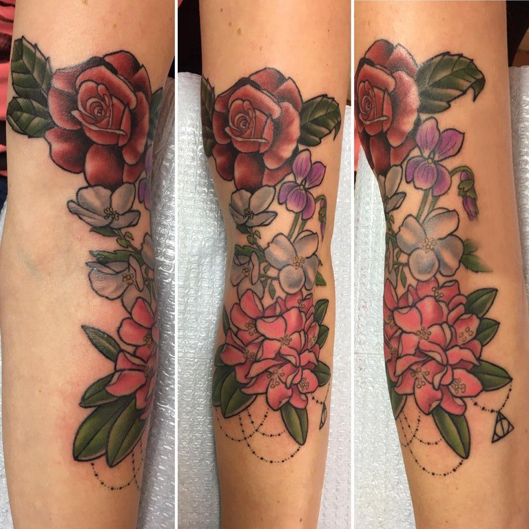 点击大图看下一张：女生手臂上彩绘渐变简单线条小清新植物花朵纹身图片