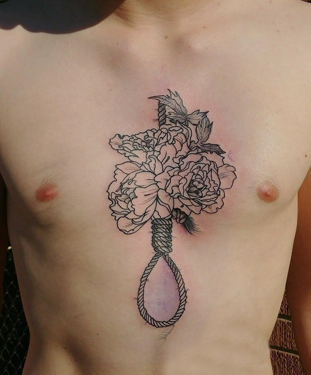点击大图看下一张：男生手臂黑色点刺简单线条植物花朵纹身图片