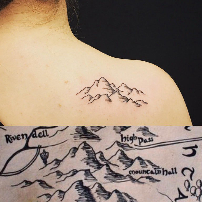 点击大图看下一张：女生背部黑灰线条素描创意文艺山脉风景纹身图片