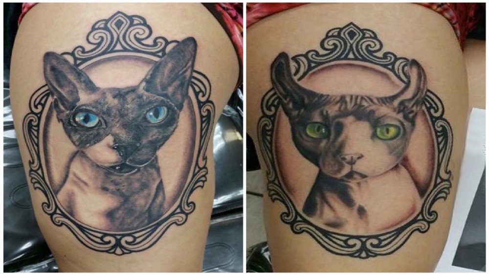 点击大图看下一张：女生大腿上彩绘渐变简单抽象线条小动物猫纹身图片