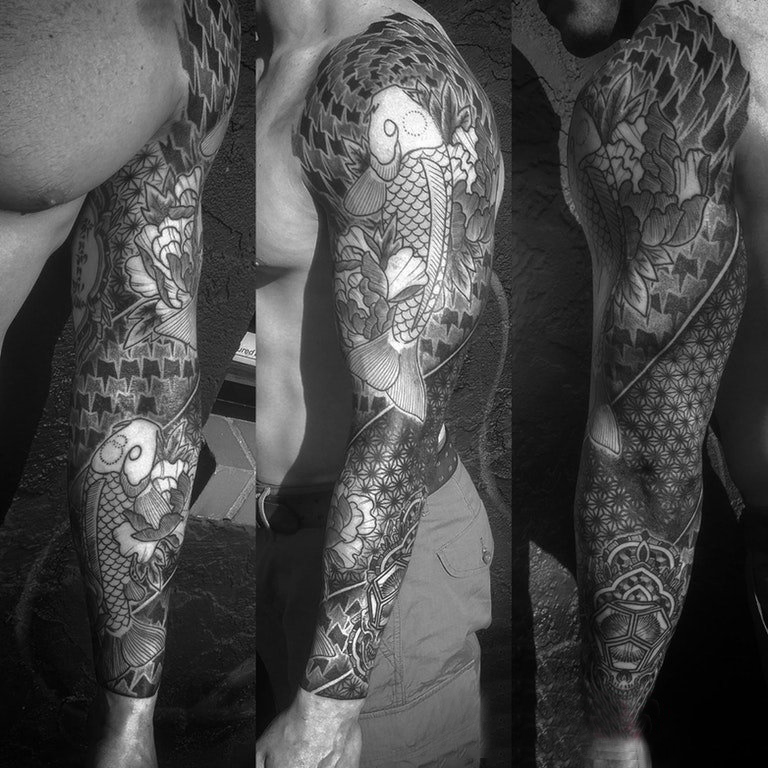 点击大图看下一张：日式花臂纹身男生手臂上日式花臂纹身图片