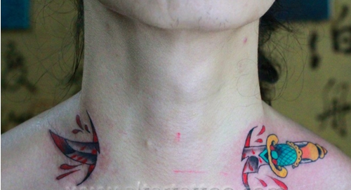 点击大图看下一张：颈部个性仿真疤痕纹身图片