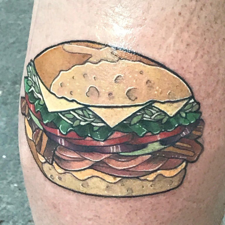 点击大图看下一张：食物纹身 男生小腿上彩色的食物纹身图片