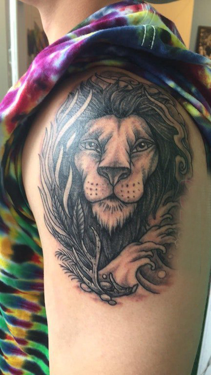 点击大图看下一张：狮子头纹身 男生手臂上狮子头纹身图片