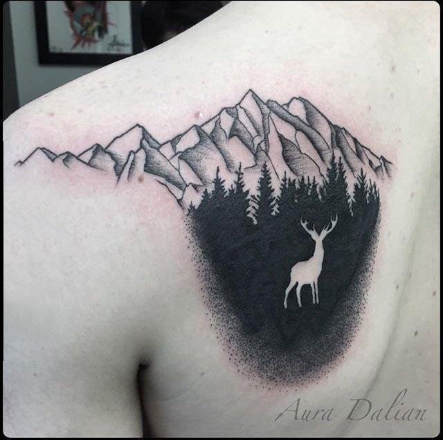 点击大图看下一张：山峰的纹身 女生背部山峰纹身图片