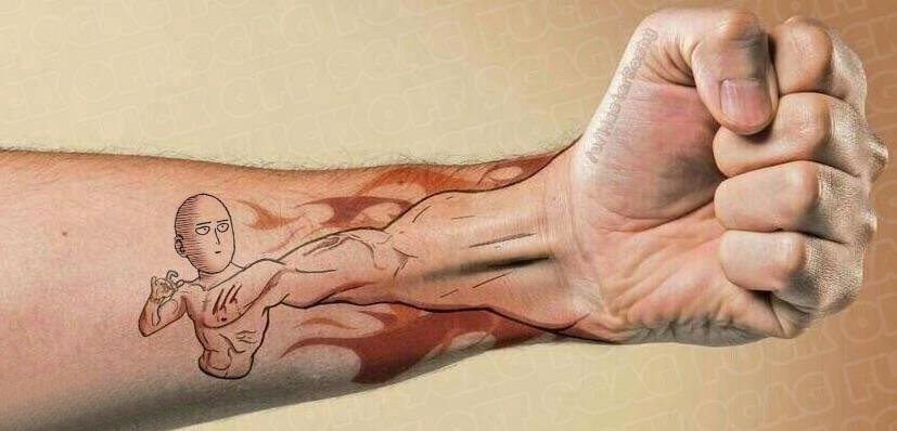 点击大图看下一张：手臂纹身素材 男生手臂上彩色的卡通纹身图片