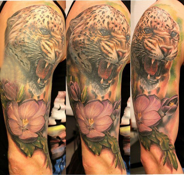 点击大图看下一张：豹子头纹身 男生手臂上豹子头纹身图片