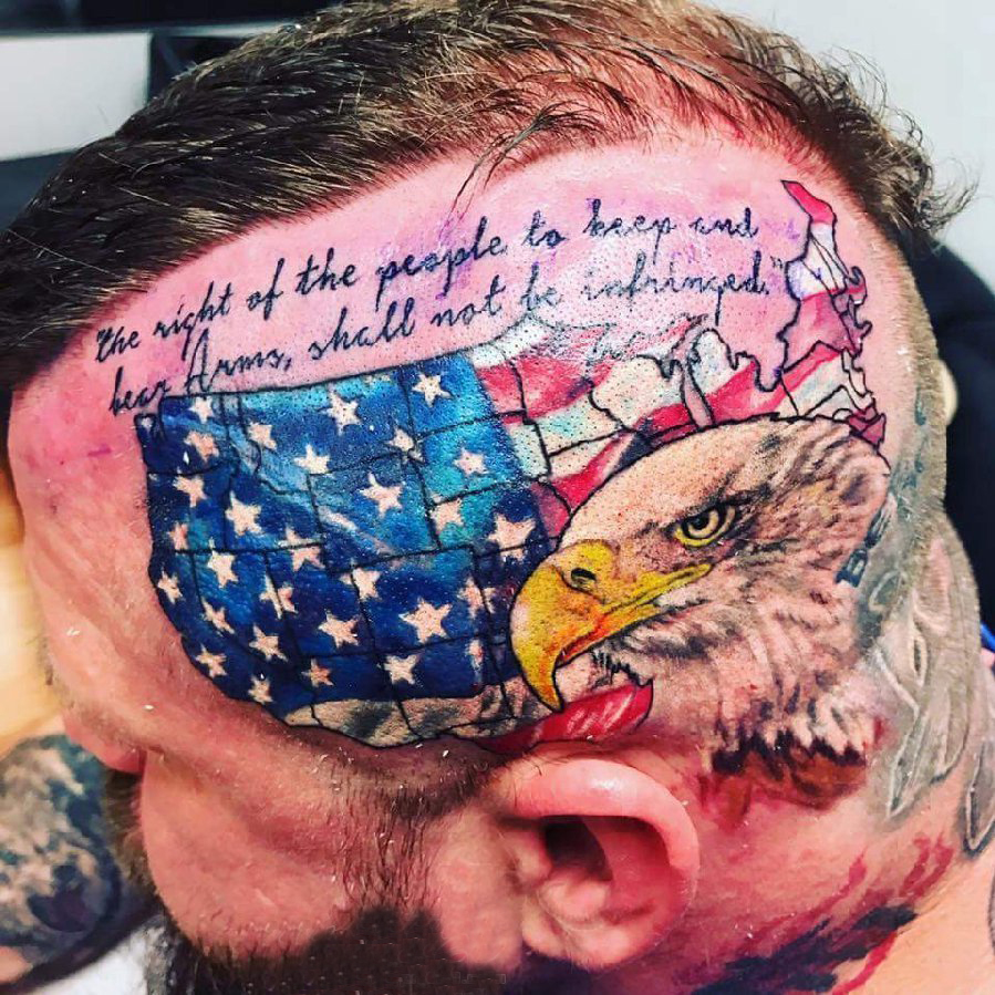 点击大图看下一张：头部纹身图案 男生头部国旗和老鹰纹身图片