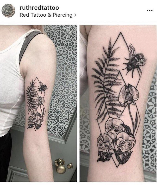 点击大图看下一张：几何花朵纹身图案 女生手臂上黑色纹身几何花朵纹身图案
