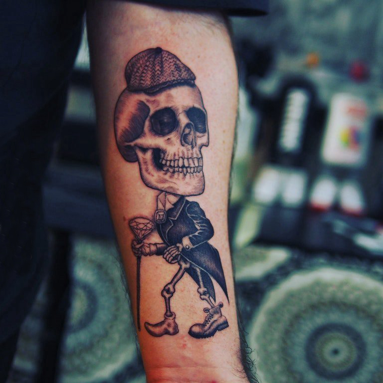 点击大图看下一张：手臂纹身素材 男生手臂上黑色的骷髅纹身图片