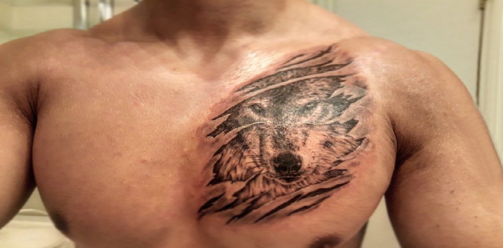 点击大图看下一张：狼纹身 男生胸部狼纹身图片