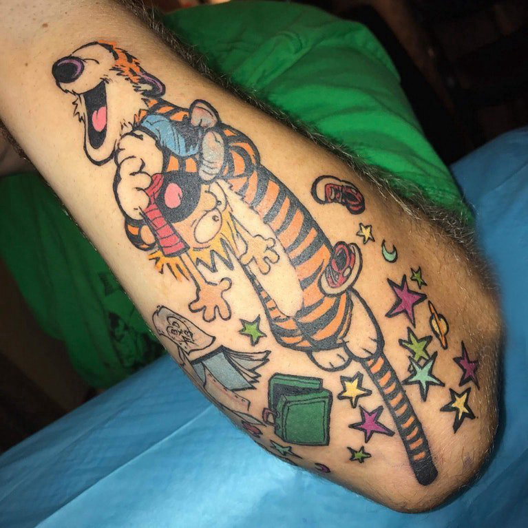 点击大图看下一张：手臂纹身图片 男生手臂上彩色的卡通纹身图片