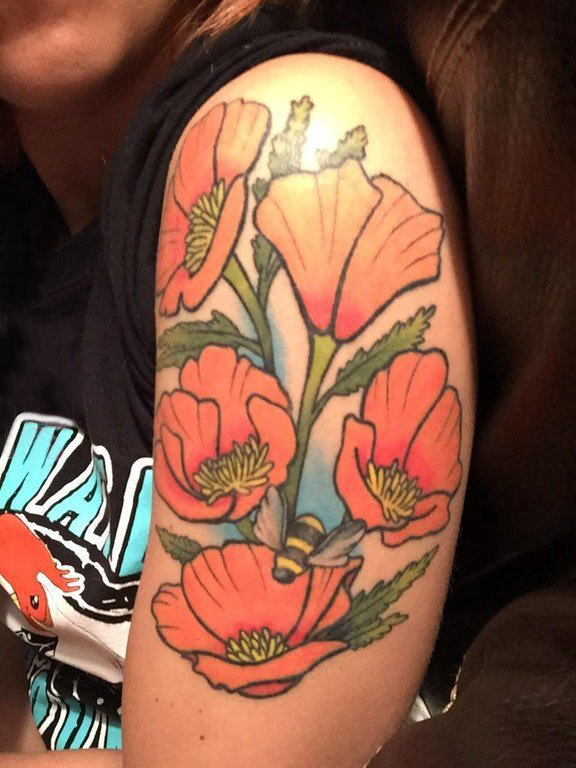 点击大图看下一张：文艺花朵纹身 女生手臂上彩绘纹身文艺花朵纹身图片