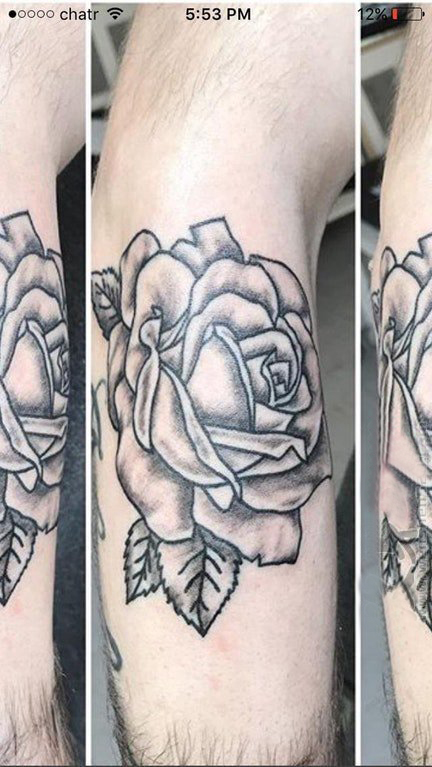 点击大图看下一张：欧美玫瑰纹身男生手臂上欧美玫瑰纹身图案