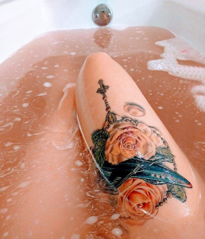 点击大图看下一张：文艺花朵纹身 女生大腿上小清新文艺纹身花朵图案