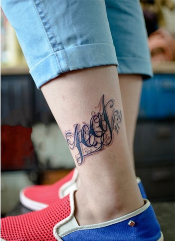 点击大图看下一张：流行英文腿部纹身