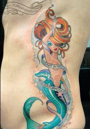 点击大图看下一张：炫彩美人鱼腰部纹身
