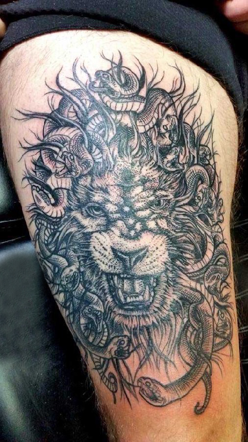 点击大图看下一张：狮子头纹身图片 女生大腿上狮子头纹身图片