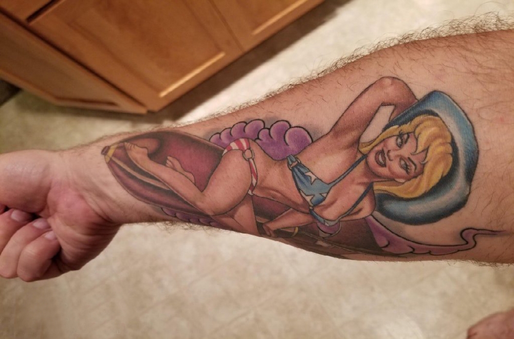 点击大图看下一张：女生人物纹身图案 女生手臂上彩色纹身女生人物纹身图案